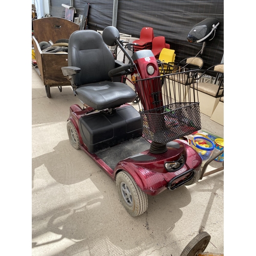 2076 - A STERLING ELITE XS MOBILITY SCOOTER WITH KEY AND A TRAILER WITH A LARGE ASSORTMENT OF SPARE WHEELS,... 