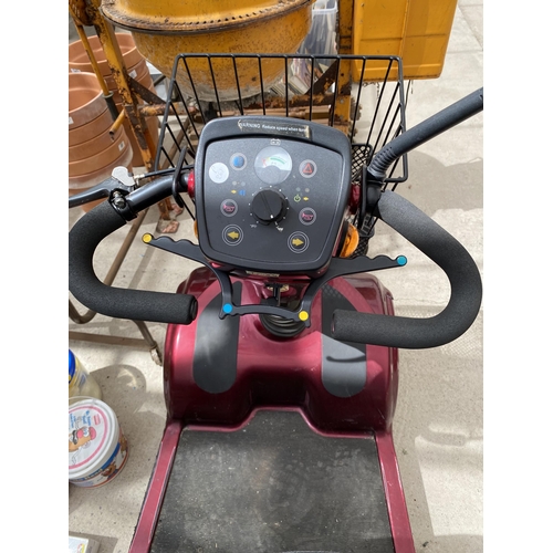 2076 - A STERLING ELITE XS MOBILITY SCOOTER WITH KEY AND A TRAILER WITH A LARGE ASSORTMENT OF SPARE WHEELS,... 