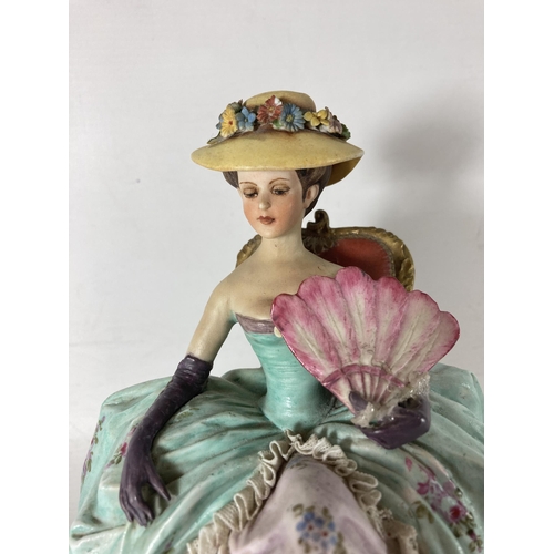 788 - A VINTAGE CAPODIMONTE FIGURE OF A LADY AT REST