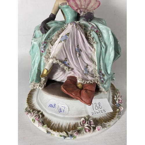 788 - A VINTAGE CAPODIMONTE FIGURE OF A LADY AT REST