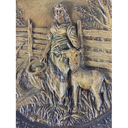 793 - AN CIRCA 1893 STONEWARE PLATE WITH AN IMAGE OF A GOATHERDER AND GOAT DIAMETER 17CM