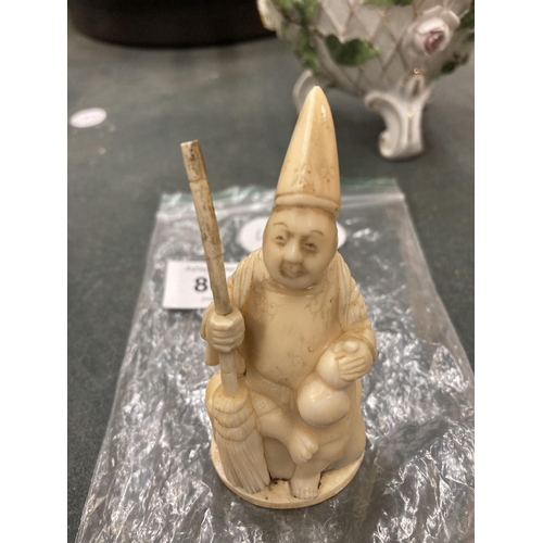 862 - A CARVED BONE FIGURE HEIGHT 9CM