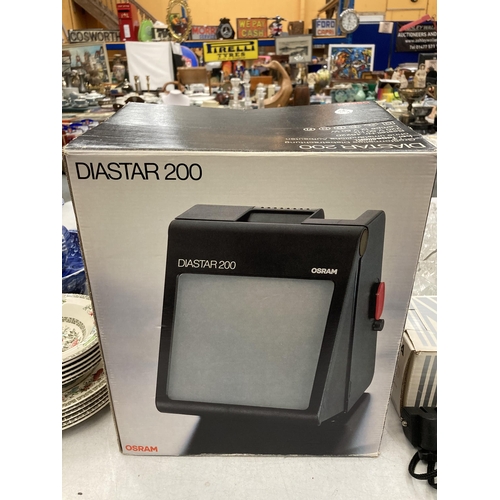 877 - A BOXED DIASTAR 200 LARGE SIZED SLIDE VIEWER FOR DAYTIME USE AND A BOXED 35MM SLIDE AND FILM SCANNER