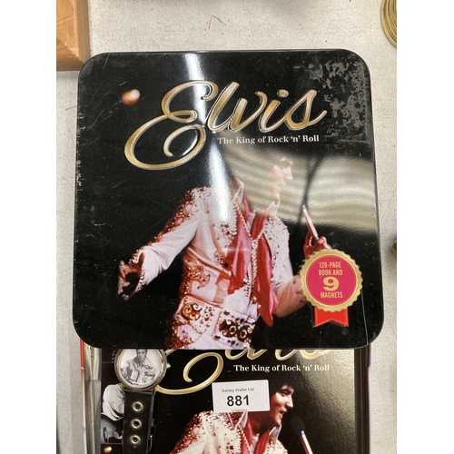 881 - AN ELVIS WRISTWATCH PLUS A BOOK AND MAGNETS IN A PRESENTATION TIN