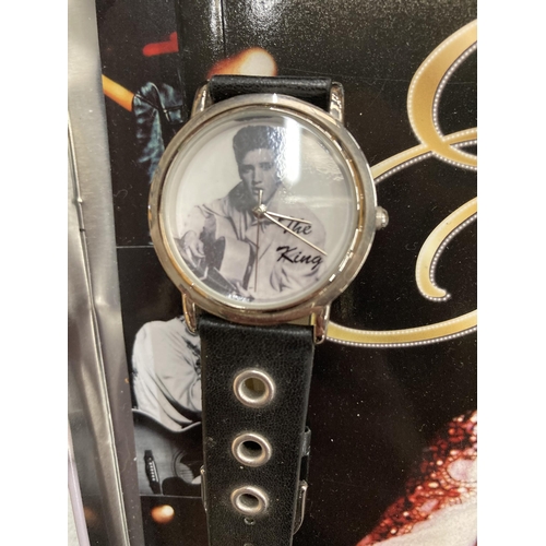 881 - AN ELVIS WRISTWATCH PLUS A BOOK AND MAGNETS IN A PRESENTATION TIN