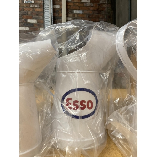 892 - A SET OF FIVE WHITE GRADUATED 'ESSO' OIL CANS