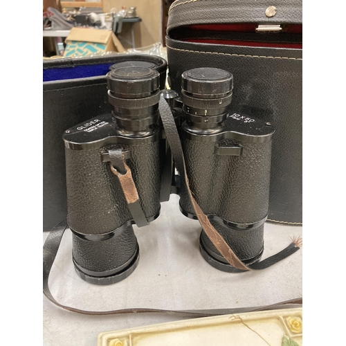 913 - TWO PAIRS OF BINOCULARS IN CASES - GLIDER AND CHINON