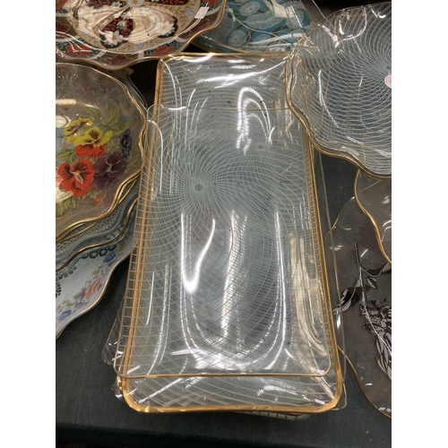 922 - A LARGE QUANTITY OF PATTERNED GLASSWARE PLATES AND SANDWICH TRAYS, ETC