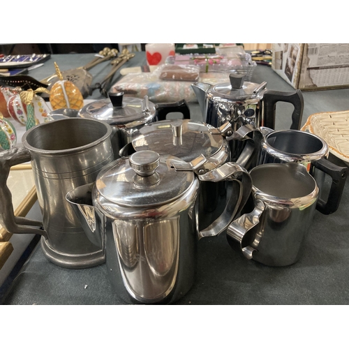 936 - A LARGE QUANTITY OF STAINLESS STEEL TO INCLUDE TRAYS, TEAPOTS, HOT WATER JUGS, CREM JUGS, SUGAR BASI... 