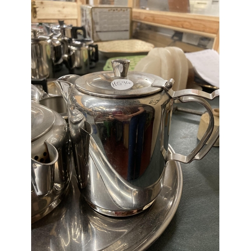 936 - A LARGE QUANTITY OF STAINLESS STEEL TO INCLUDE TRAYS, TEAPOTS, HOT WATER JUGS, CREM JUGS, SUGAR BASI... 