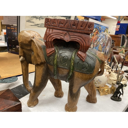 97 - A LARGE WOODEN ELEPHANT PLANT STAND HEIGHT 47CM, LENGTH 48CM