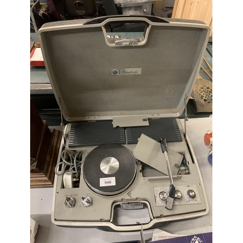 940 - A VINTAGE PYE PORTABLE RECORD PLAYER IN A CASE