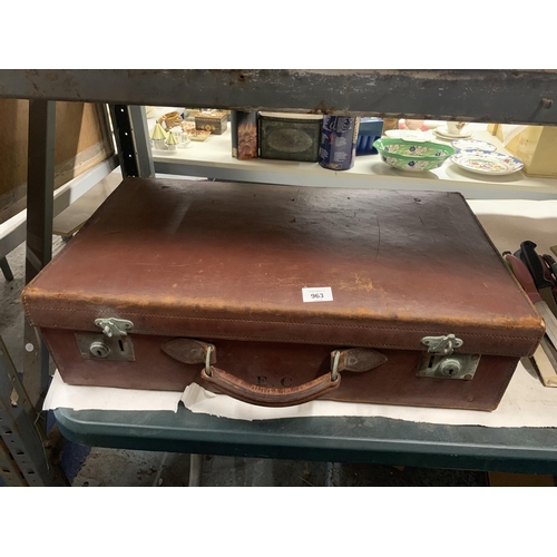 963 - A VINTAGE LEATHER LARGE SUITCASE WITH INITIALS E.C.