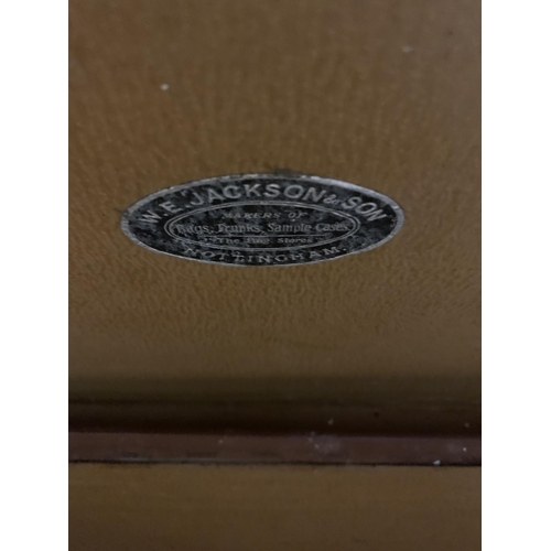 963 - A VINTAGE LEATHER LARGE SUITCASE WITH INITIALS E.C.