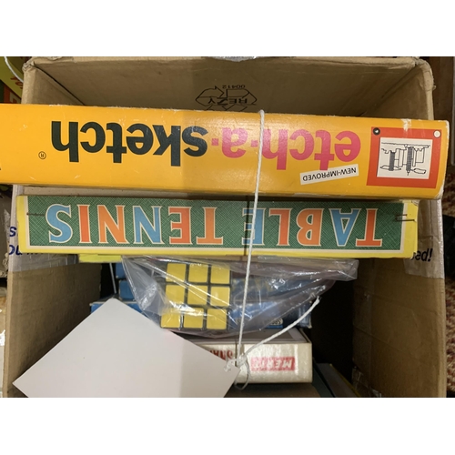 496 - THREE BOXES OF VINTAGE AND MODERN CHILDRENS GAMES AND A SUPER SOCCER GAME