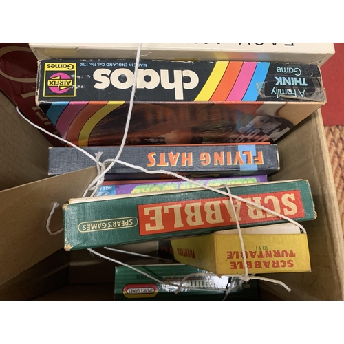 496 - THREE BOXES OF VINTAGE AND MODERN CHILDRENS GAMES AND A SUPER SOCCER GAME