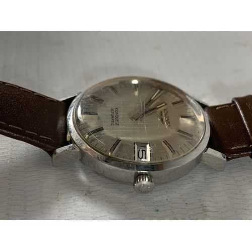 530A - A VINTAGE LONGINES CONQUEST AUTOMATIC WRIST WATCH WITH LEATHER STRAP SEEN WORKING BUT NO WARRANTY