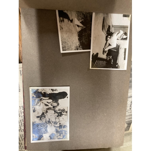 1001 - A VINTAGE LEATHER SUITCASE CONTAINING A QUANTITY OF EPHEMERA AND PHOTOGRAPHS