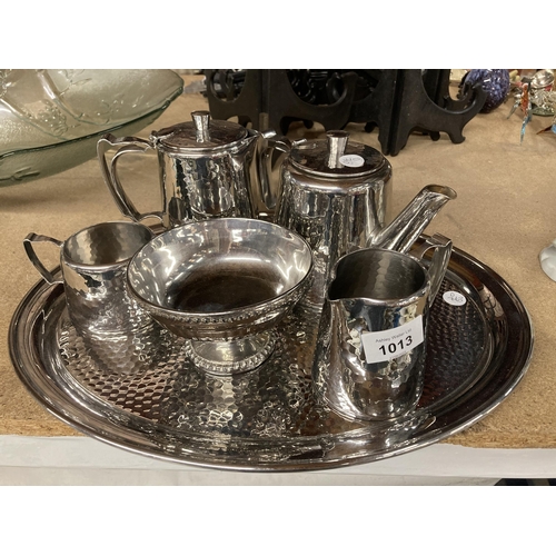 1013 - A SILVER PLATED OLD HALL TEASET TO INCLUDE A TRAY, TEAPOT, HOT WATER JUG, CREAM JUG AND SUGAR BOWLS