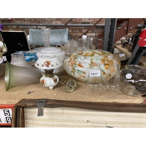 1017 - A QUANTITY OF VINTAGE GLASS LIGHT SHADES, A SMALL CERAMIC OIL LAMP, GLASS AND BRASS WALL LIGHT, ETC