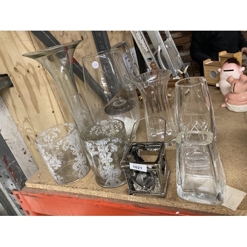 1021 - A QUANTITY OF GLASSWARE VASES AND CANDLE HOLDERS