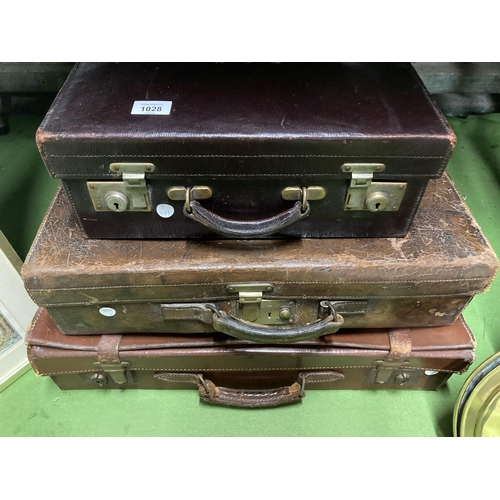 1028 - THREE VINTAGE LEATHER SUITCASES