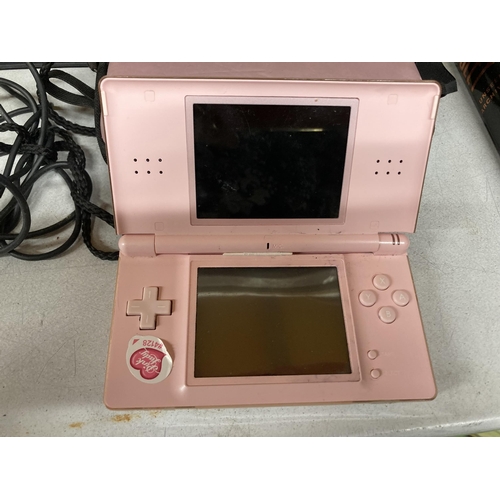 1043 - APINK NINTENDO DS LITE WITH CHARGER AND CASE, PHOTO ALBUM AND STATIONERY ITEMS