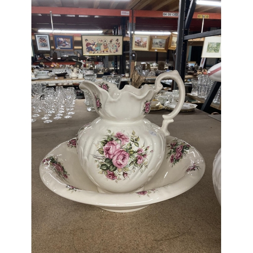 1055 - A VICTORIAN WASH BOWL AND JUG PLUS A LARGE JUG