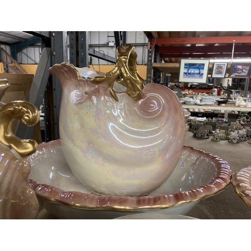 1057 - TWO LARGE CERAMIC WASHBOWLS AND SHELL SHAPED JUGS, A CHAMBER POT AND A SLOP-PAIL