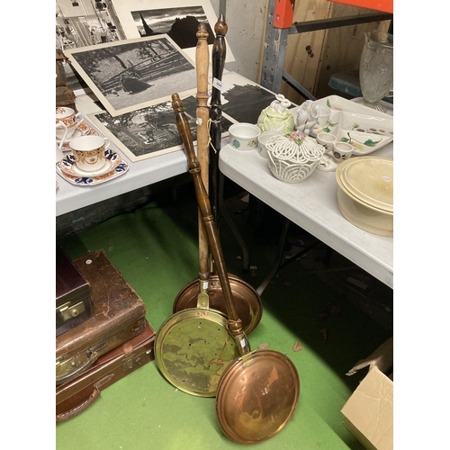 994 - THREE VINTAGE COPPER AND BRASS BED WARMERS