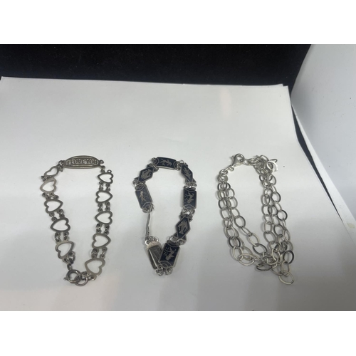 519 - SIX SILVER BRACELETS