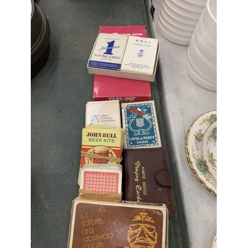 860 - A COLLECTION OF VINTAGE PLAYING CARDS, ETC