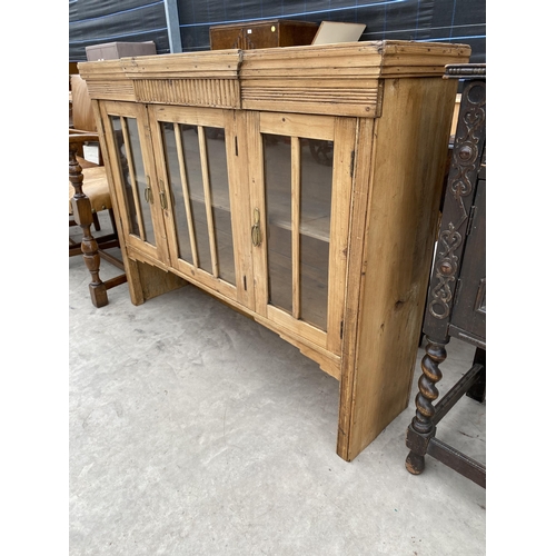 2922 - A VICTORIAN PINE THREE DOOR GLAZED CUPBOARD, 48