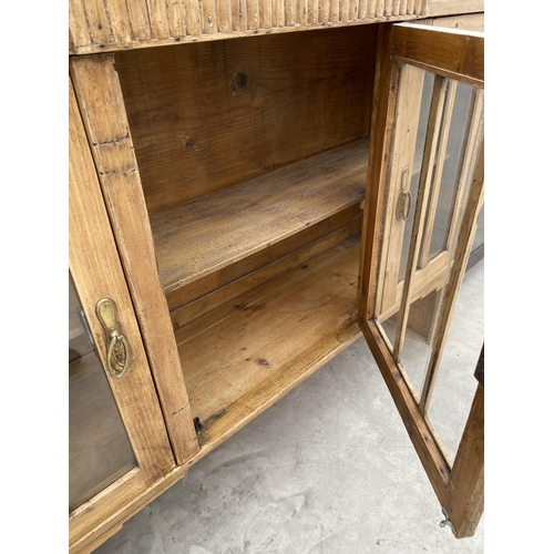 2922 - A VICTORIAN PINE THREE DOOR GLAZED CUPBOARD, 48