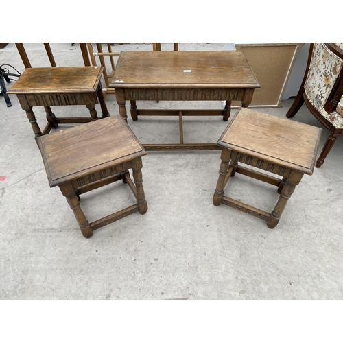 2930 - A NEST OF THREE OAK TABLES AND SINGLE BENTWOOD TABLE