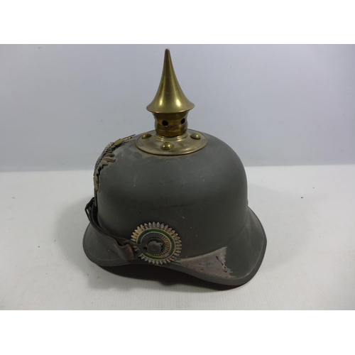 302 - A REPLICA IMPERIAL GERMAN PICKELHAUBE METAL HELMET WITH LEATHER LINING