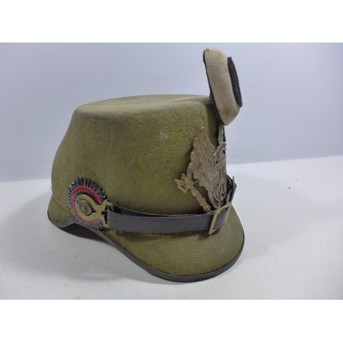 305 - A REPLICA IMPERIAL GERMAN HELMET WITH LEATHER LINING