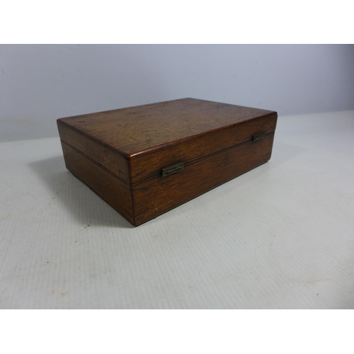 312 - A MAHOGANY BOX FITTED OUT TO TAKE A PISTOL, SIZE OF BOX WIDTH 19.5CM, DEPTH 14CM AND HEIGHT 6CM