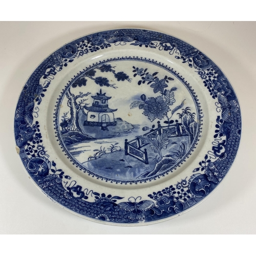 307 - A LARGE CHINESE EARTHENWARE POTTERY BLUE AND WHITE CHARGER WITH PAGODA LANDSCAPE DESIGN, DIAMETER 35... 