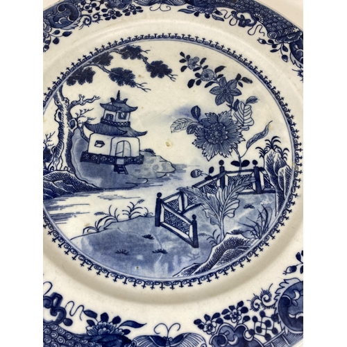 307 - A LARGE CHINESE EARTHENWARE POTTERY BLUE AND WHITE CHARGER WITH PAGODA LANDSCAPE DESIGN, DIAMETER 35... 