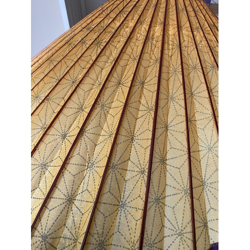 368 - A VINTAGE JAPANESE PARASOL UMBRELLA WITH GEOMETRIC INTERIOR DESIGN, LENGTH 73CM