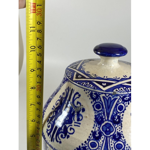 369 - A LARGE VINTAGE IZNIK MIDDLE EASTERN LIDDED BLUE AND WHITE POT, SIGNED TO BASE, HEIGHT 27CM