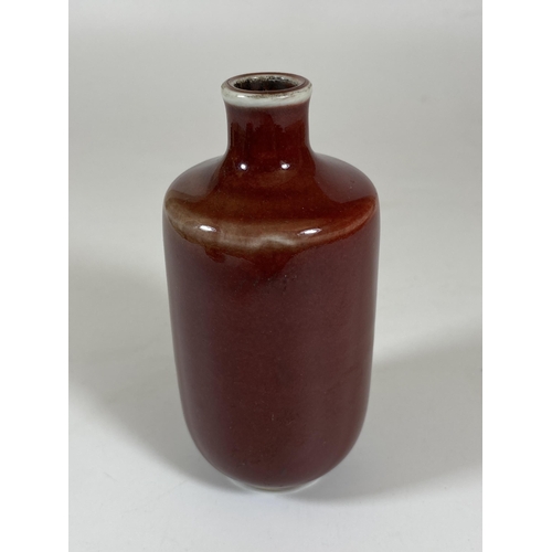 399 - A CHINESE SANG DE BOEUF BOTTLE VASE, HEIGHT 12CM