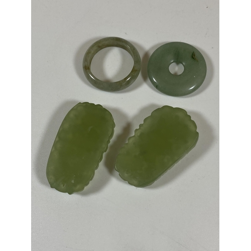 404 - A GROUP OF FOUR CHINESE JADEITE JADE STYLE ITEMS - TWO CARVED PENDANT PLAQUES AND TWO RINGS