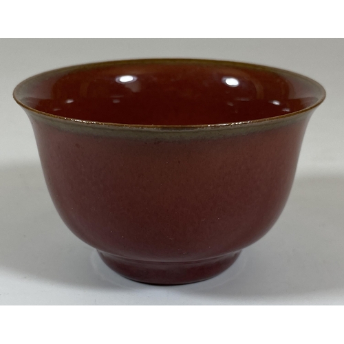 408 - A CHINESE SANG DE BOEUF PORCELAIN TEA BOWL, DIAMETER 7CM