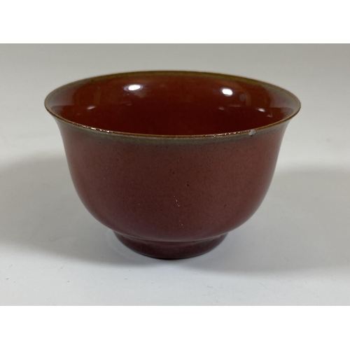 408 - A CHINESE SANG DE BOEUF PORCELAIN TEA BOWL, DIAMETER 7CM