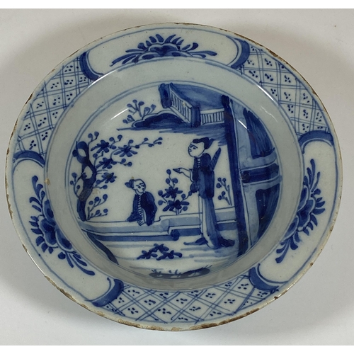 410 - AN EARLY 19TH CENTURY DELFT ORIENTAL DESIGN BLUE AND WHITE PORCELAIN PLATE, DIAMETER 16.5CM