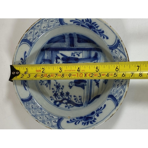 410 - AN EARLY 19TH CENTURY DELFT ORIENTAL DESIGN BLUE AND WHITE PORCELAIN PLATE, DIAMETER 16.5CM