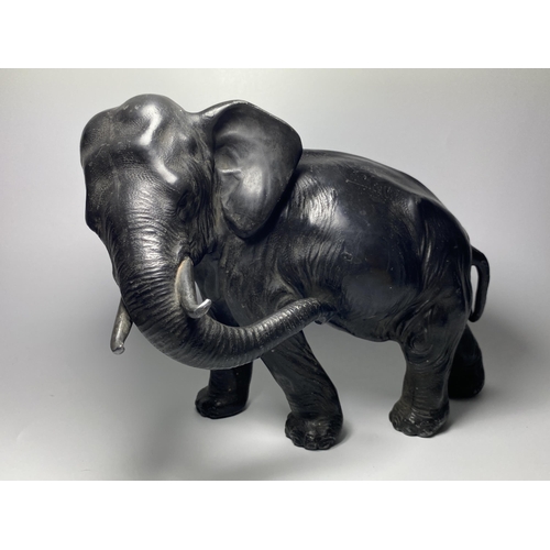 454 - AN EARLY 20TH CENTURY JAPANESE METAL MODEL OF AN ELEPHANT, 20 X 27CM