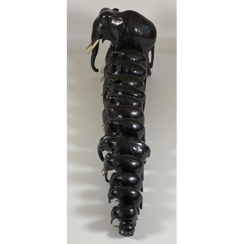 466 - A SET OF FOURTEEN ANTIQUE EBONISED / EBONY ELEPHANTS, LARGEST 16CM, SMALLEST 2CM